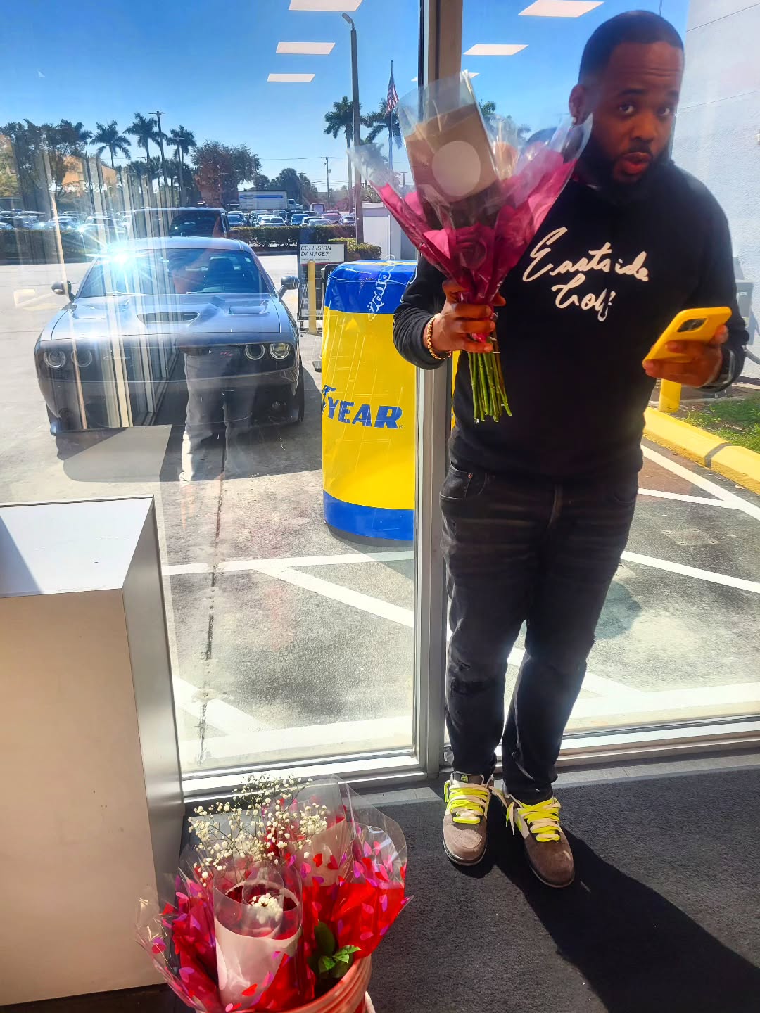 Happy customer with flower bouquet